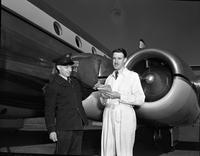 New York Flight: Postmaster with Don Rogers in front of Jetliner