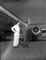 New York Flight: Don Rogers with McGregor standing in front of Jetliner