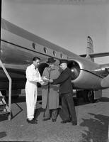 New York Flight;  Postmaster, Mr.  McGregor and Don Rogers standing in front of Jetliner